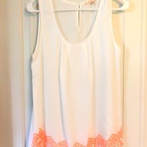 White Tank Top with Bright Orange Details
